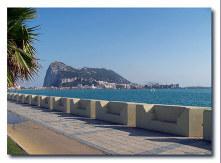 Gibraltar is a British overseas territory located on the southern end of the Iberian Peninsula at the entrance of the Mediterranean.